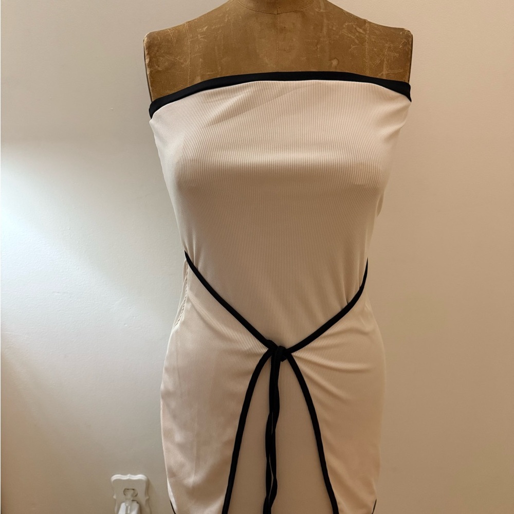 Elegant Off-Shoulder Cream Dress with Black Trim